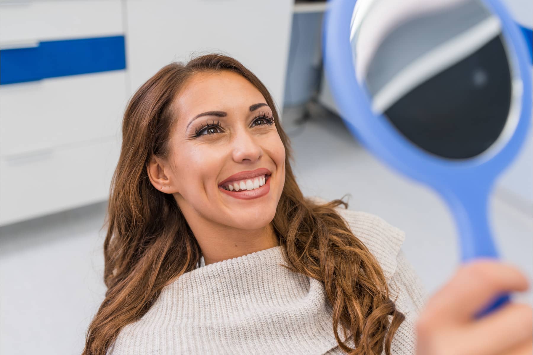 Patient smiling after same-day smile treatment in Fort Wayne IN at Blair Dental